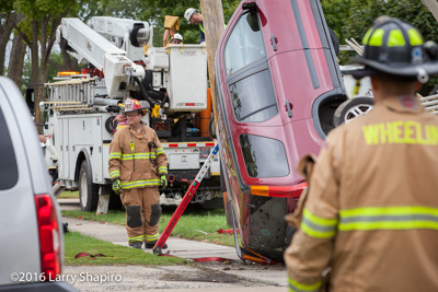 Wheeling Fire Department SUV crash in Wheeling 9-23-16 shapirophotography.net Larry Shapiro photographer car stuck on utility pole support cable